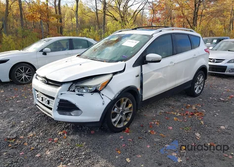 2015 Ford Escape Titanium z USA, uszkodzony, nr VIN 1FMCU9J94FUB17662